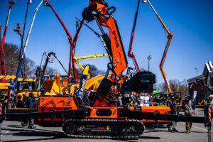 Multiple cranes in a parking lot